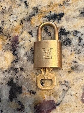 Louis Vuitton Gold-Tone LV Monogram Padlock with Key
